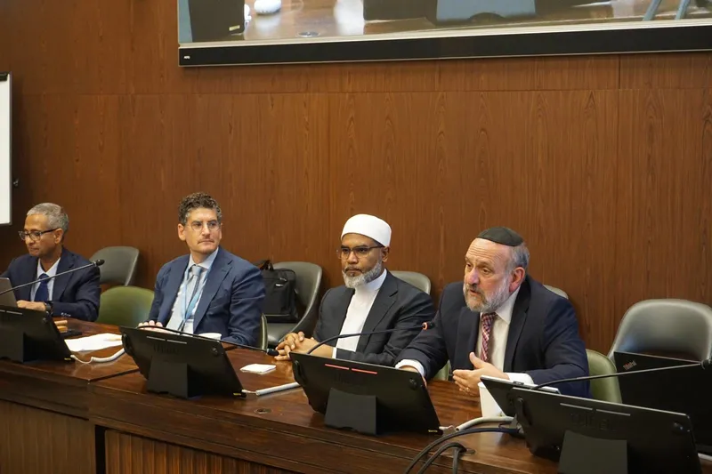 Chief Rabbi Michael Schudrich and Mufti Prof. Dr Faid Mohammed Said seated side by side at the panel table of the side event in Geneva.
