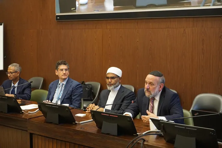 Chief Rabbi Michael Schudrich and Mufti Prof. Dr Faid Mohammed Said seated side by side at the panel table of the side event in Geneva.