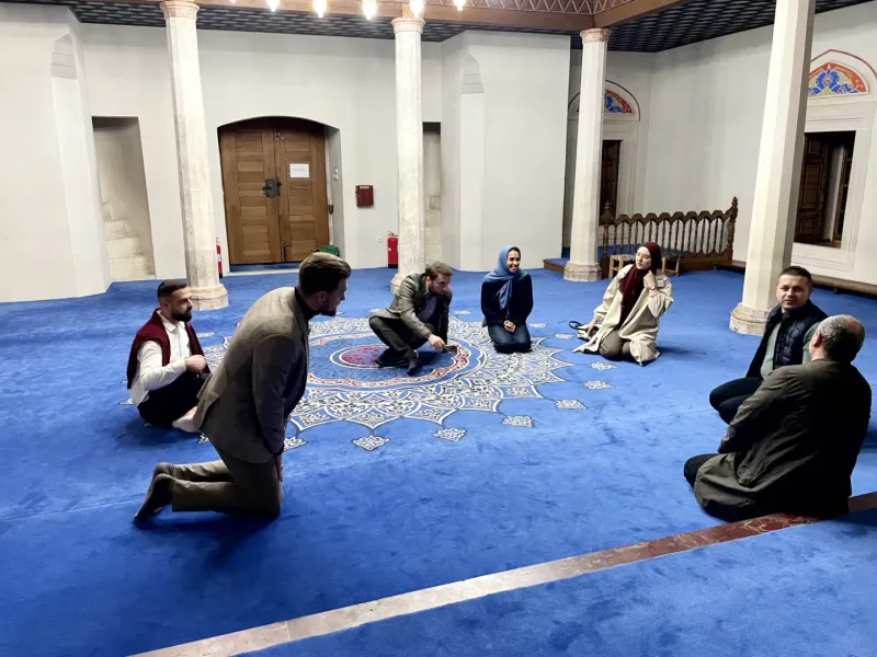 MJLC Sarajevo Ambassadors Eldar Šabić and Vladimir Andrle with participants in historic mosque